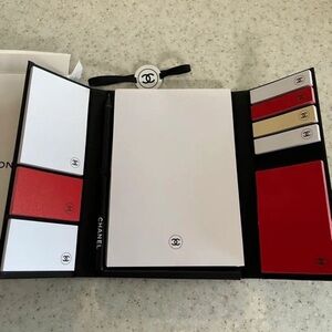 Chanel sticky note book with pen and band